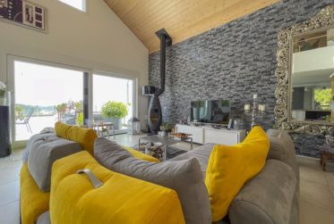 Villa contemporaine avec vue panoramique sur les Préalpes – Un bien rare au cœur d’un quartier résidentiel prisé