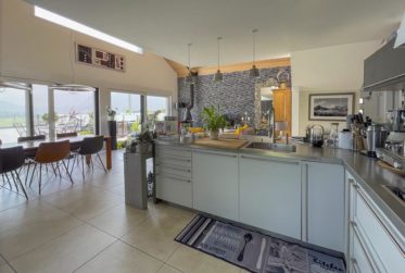 Villa contemporaine avec vue panoramique sur les Préalpes – Un bien rare au cœur d’un quartier résidentiel prisé